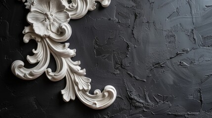 White ornamental plaster molding detail on black background. - obrazy, fototapety, plakaty