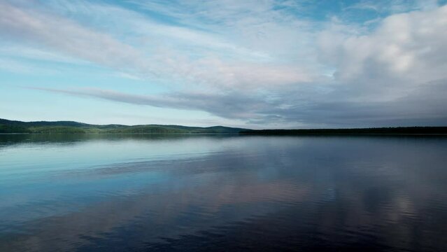 Capture the breathtaking beauty of Lake Baikal and the Angara River from above in stunning aerial footage. Ships and boats glide through the crystal-clear waters, offering fantastic views.