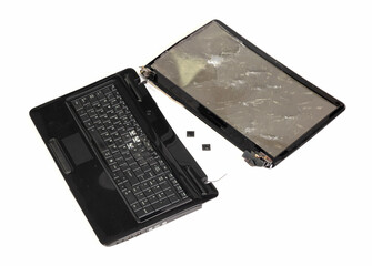 Old broken laptop isolated on white background