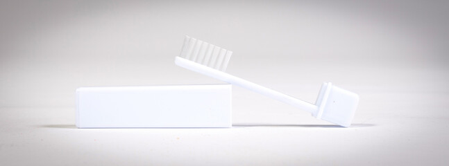 Simple toothbrush, isolated on green - 779426066