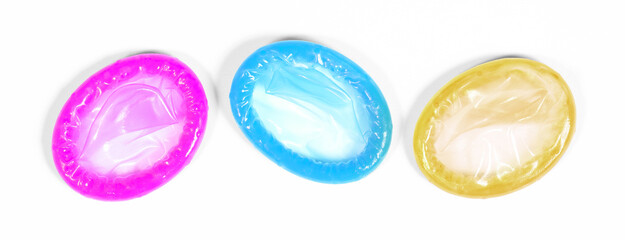 Condoms isolated on solid background - 779426088