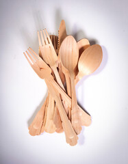 Wooden cutlery knifes forks and spoons made of wood timber material, isolated - 779426098