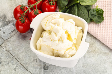 Soft cream cheese in the bowl
