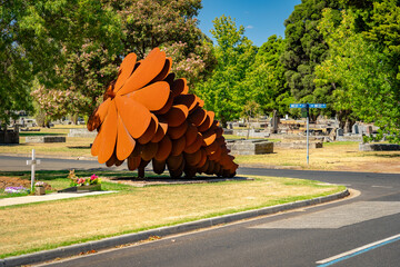 Giant pine cone art object in Springvale Botanical Cemetery, Melbourne, Australia