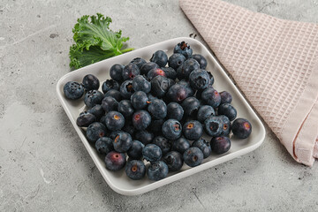 Sweet ripe blueberry on the bowl
