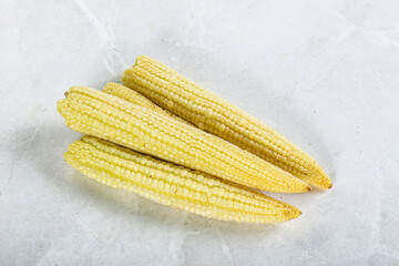Raw sweet baby corn heap
