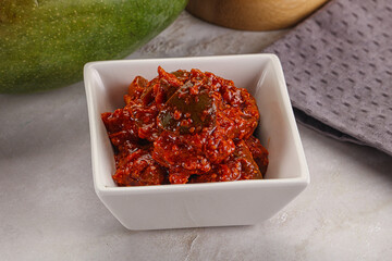 Spicy pickled raw green mango