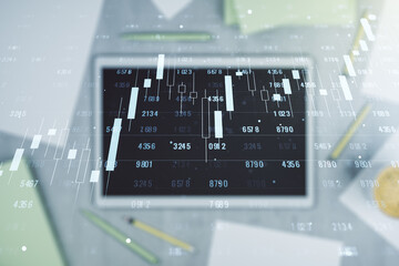 Double exposure of abstract creative statistics data hologram and modern digital tablet on background, analytics and forecasting concept