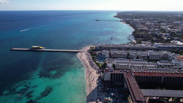 Playa del Carmen, Mexico. Aerial View of Pier, Luxury Waterfront Buildings and Beach on Sunny Day
