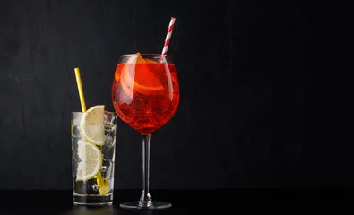 Gordijnen Aperol spritz and gin tonic cocktails © karandaev