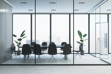 Bright glass conference room interior with furniture and panoramic window with city view and...