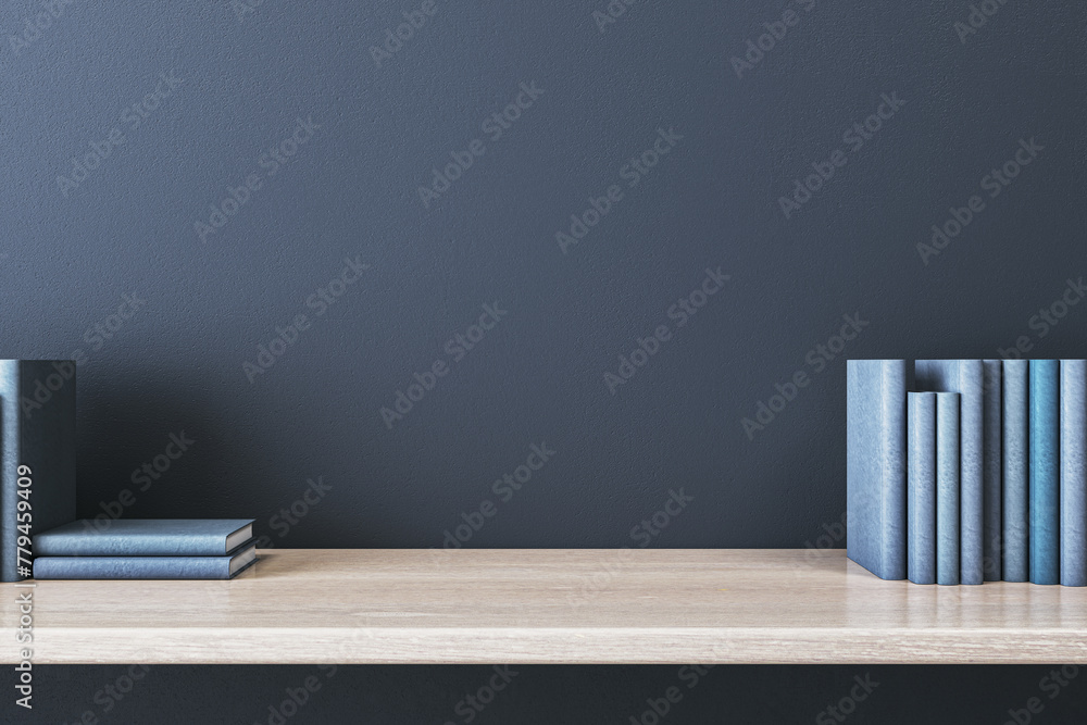 Aufkleber close up of creative wooden designer desk with books and empty mock up place on blue concrete wall. 