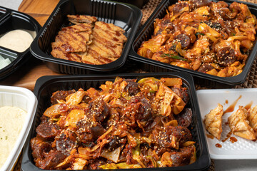 Gopchang, vegetables, stir-fry, sundae, dumplings, fried dumplings, lettuce, radish, ssamjang, pork cutlet, cabbage, chili pepper, garlic, and steamed eggs