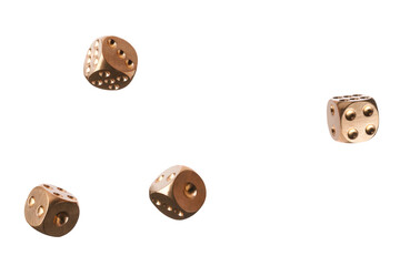 Four golden dice in air on white background