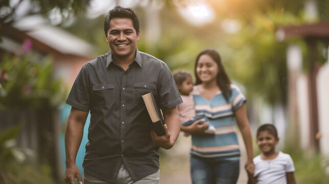 Happy man walks with Bible book under his arm with family
