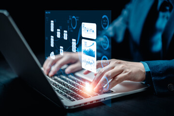 Businesswomen analyze chart data business on a visual screen dashboard laptop, technology devices...