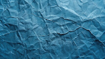 Obraz premium Blue crumpled paper background.