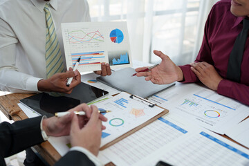 Financial analyst analyzes businessman investment consultant analyzing company financial report...