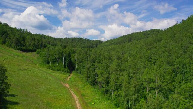 "Capture the breathtaking beauty of Lake Baikal and the Angara River from above in stunning aerial footage. Ships and boats glide through the crystal-clear waters, offering fantastic views.