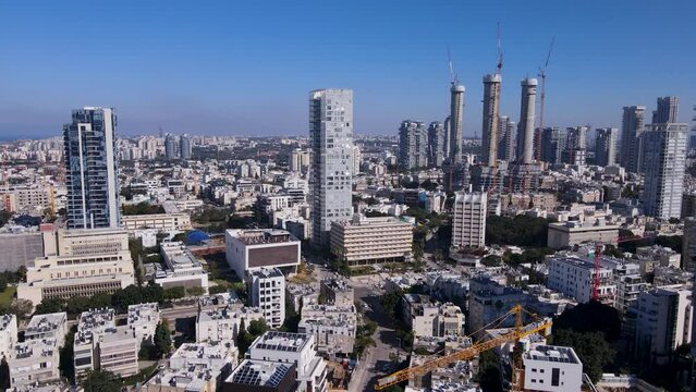 David Bloch street in Tel Aviv Israel with skyscraper high rises soaring above apatments