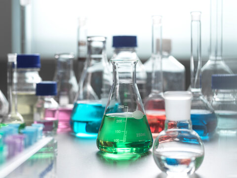 Laboratory glassware with multi colored chemical sample