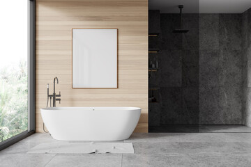 Gray and wooden bathroom with tub, shower and poster