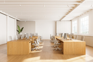 Wooden coworking interior with pc computers on desks in row, panoramic window - 779483891