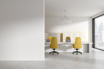 White and yellow open space office interior with blank wall