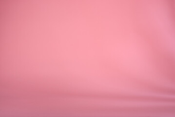 Pink paper background with light shadows. Texture. background.