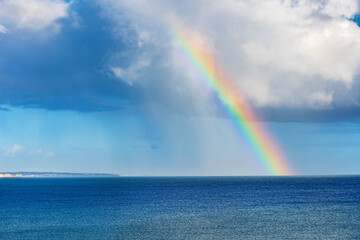 Rainbow Above Atlantic Ocean In Portugal