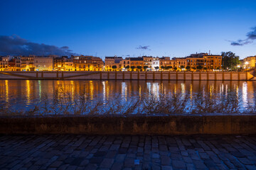 Triana District Skyline In Seville At Night