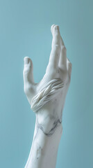 Marble statue white hand . on pastel blue background