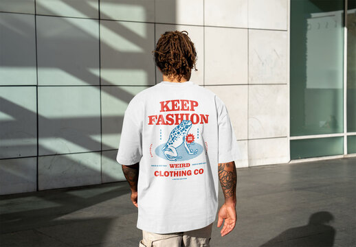 Mockup of man in customizable t-shirt, rear view