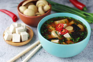 A bowl with miso soup, traditional Japanese dish	