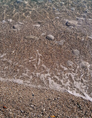 Beach. Crystal clear sea water and sand.