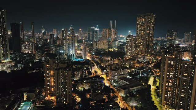 Aerial view of Mumbai city at night. Mumbai night view cityscape. Central Mumbai's cityscape and skyline- Lalbaug-Parel, Lower Parel, Worli, Curry Road, Prabhadevi.