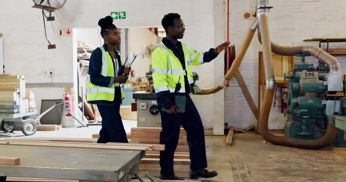 Safety, inspector and people in warehouse with tablet, checklist and chat about industrial compliance. Factory, maintenance and inspection of construction in workshop and discussion of logistics