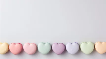 Gartenposter Pastel-colored heart macarons © TY