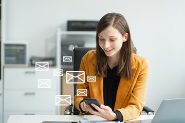 Email notification concept, Female use smartphone and laptop receive message alert in the mailbox.