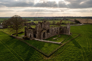 Beautiful aerial view of Bective Abbey, Co. Meath. Evening light backlights the Abbey creating a...