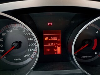 Car control panel with speedometer and tachometer. Lighting and dashboard in the car. Car...
