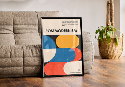 Mockup of customizable vertical poster frame by couch