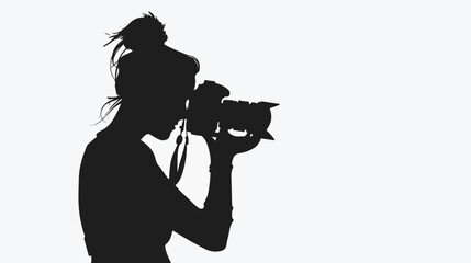 A black silhouette of a female photographer taking photo