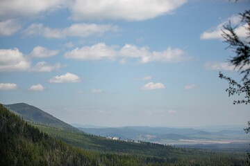 Beautiful landscape in the High Tatras mountain range in Slovakia with vast green fields and forests