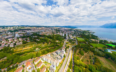 Lausanne, Switzerland. Lake embankment and city panorama in summer. Aerial view