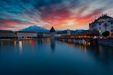 Sunset in historic city center of Lucerne with famous Chapel Bridge and lake Lucerne (Vierwaldstattersee), Canton of Lucerne, Switzerland