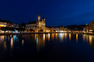 Lucerne (Luzern) panorama at night with view of Jesuit church and Reuss River, Switzerland