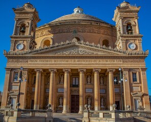 Old architectural building under the blue sky in Malta.