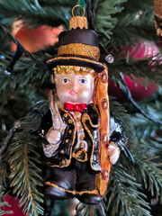 colorful Christmas ornaments hanging on the tree 