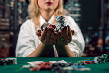 young girl player came to the casino to play poker with cards and chips. poker. casino